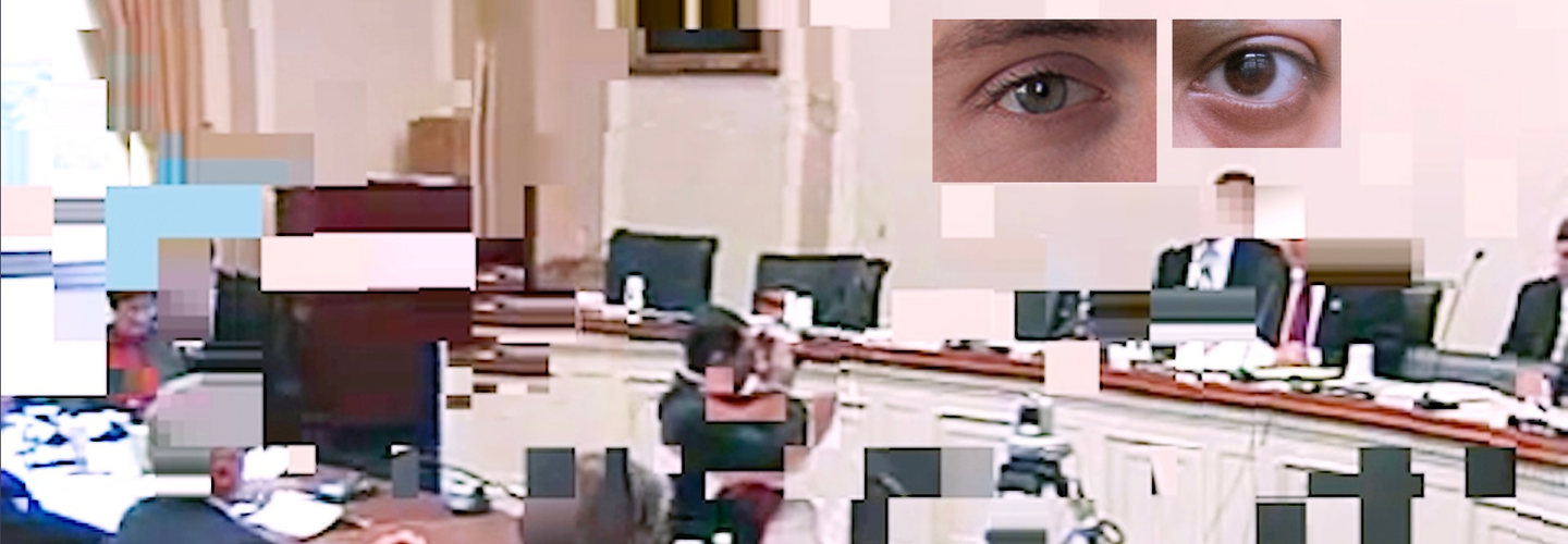 pixelated video footage of a government hearing with 2 cropped photos of an eye overlaid on the top right corner 