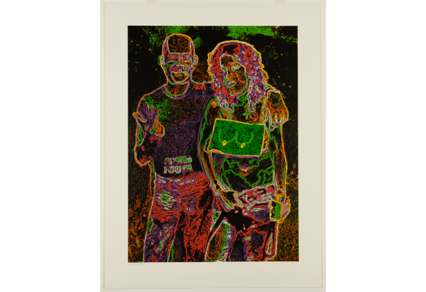 Negative image with neon colors depicting two casually clothed people standing close to one another