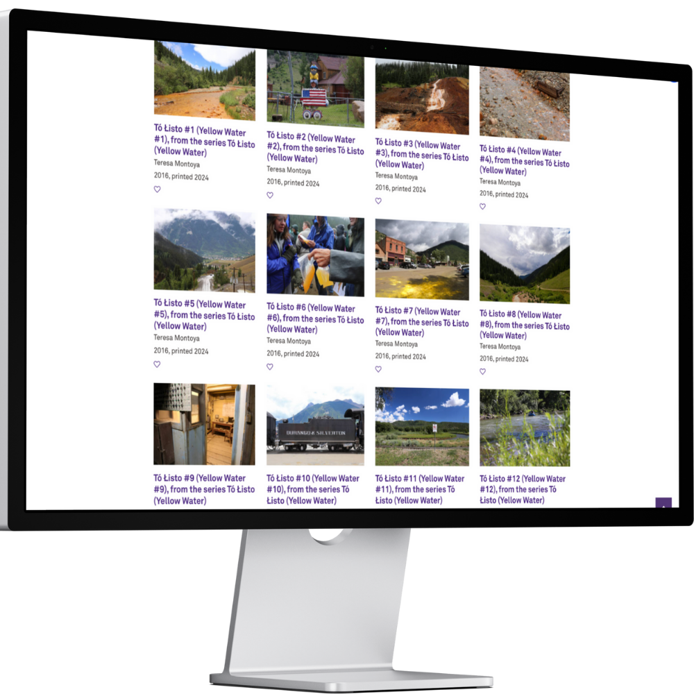 A computer displaying a website with multiple image feature boxes.