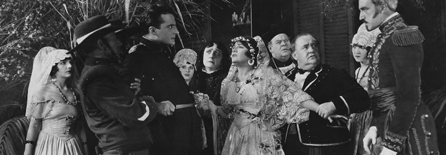 Black and white image of dramatic group scene