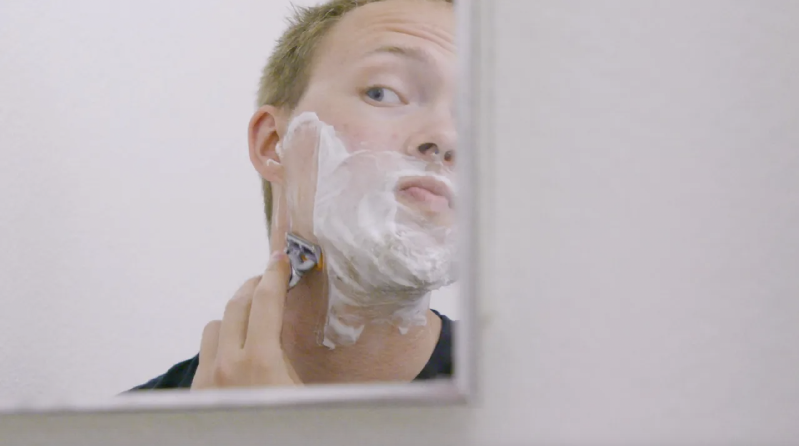 Shaving in the mirror