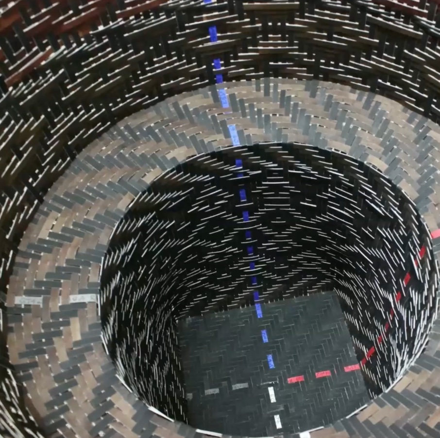 Interior view of a black and brown woven basket